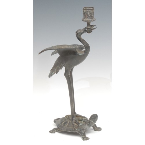 1703 - A 19th century dark patinated bronze candlestick, after Antoine-Louis Barye (1795-1875), as a stork ... 