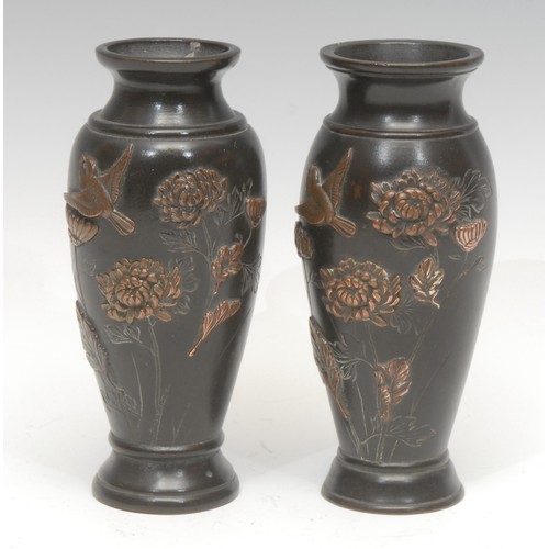 1652 - A pair of Meiji period Japanese dark patinated bronze and shakudo mounted vases, of shouldered form,... 