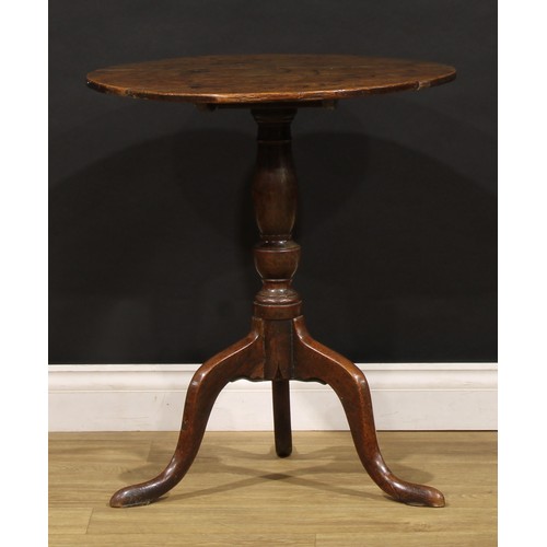 1900 - A George III oak tripod occasional table, near-circular tilting top, turned column, cabriole legs, 7... 