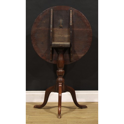 1900 - A George III oak tripod occasional table, near-circular tilting top, turned column, cabriole legs, 7... 