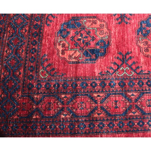 2064 - An Afghan design Ersari type rectangular wool rug or carpet, 353cm x 251cm