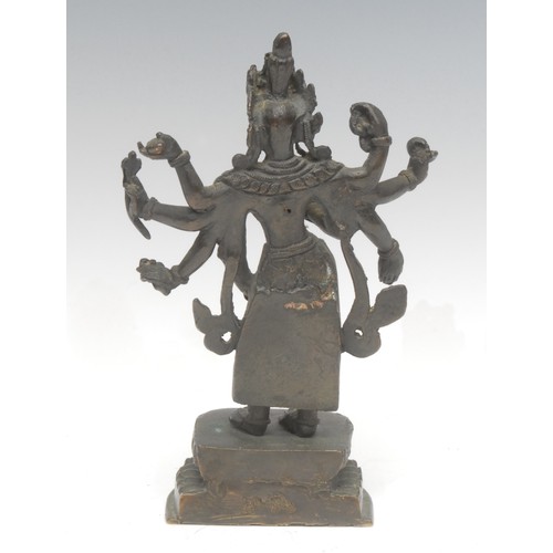 1706 - A 19th century Indian dark patinated bronze, as Vishnu, he stands on a lotus leaf, 19.5cm high overa... 