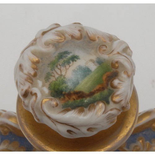 1191 - A 19th century Russian porcelain perfume or scent bottle and stopper, decorated with landscaped view... 