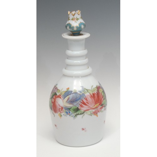 1373 - A Victorian Bristol camphor glass decanter, hand-painted in enamel with a band of flowers, the stopp... 