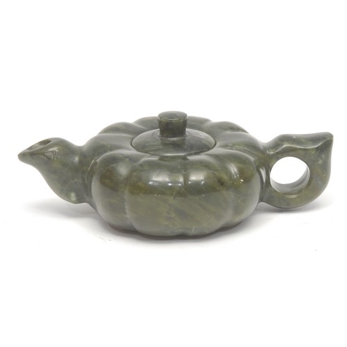 1391 - A Chinese export ware jade teapot and cover, of squat pumpkin form, 6cm high, 17cm long