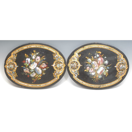 1854 - A pair of Victorian papier-mâché and mother of pearl inlaid table plateaux or trays, the centres dec... 