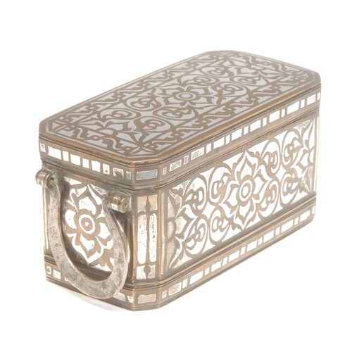 1856 - A Philippines silver inlaid brass betel box, of canted rectangular shape, the hinged cover decorated... 