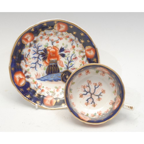 1301 - A rare Coalport Church Gresley pattern cup and saucer, painted with flowers, c.1810; a Spode Imari p... 