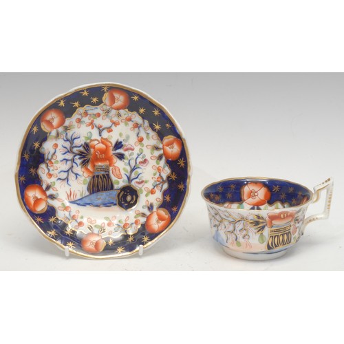 1301 - A rare Coalport Church Gresley pattern cup and saucer, painted with flowers, c.1810; a Spode Imari p... 