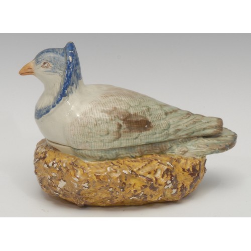 1316 - A Staffordshire pearlware sauce tureen and cover, modelled as a collared dove or pigeon seated on a ... 