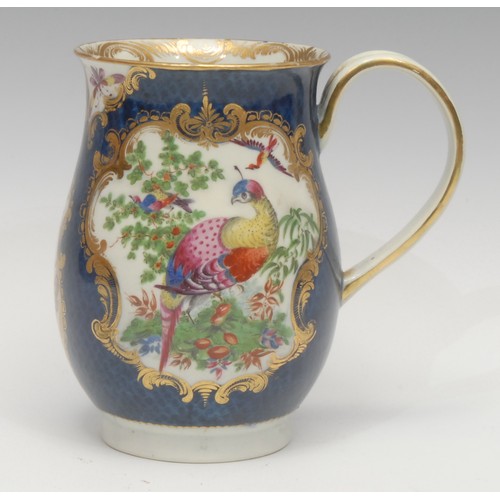 1318 - A large Worcester bell shaped mug, painted with fanciful birds within gilt cartouches, the scale blu... 