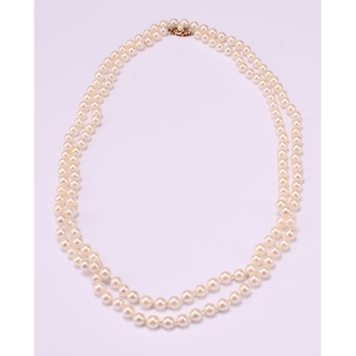 608 - A long singlestrand pearl necklace, 9ct gold clasp, 122cm long