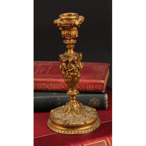 1660 - A 19th century French Bacchanalian gilt bronze candlestick, well cast with the Cherubs representing ... 