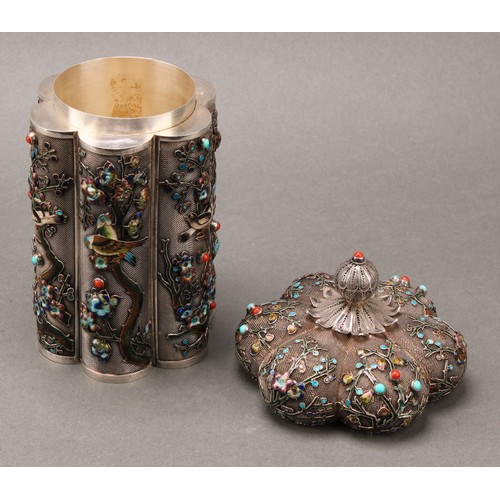 215 - A Chinese silver and enamel lobed cylindrical pagoda shaped tea caddy, double-walled and applied on ... 