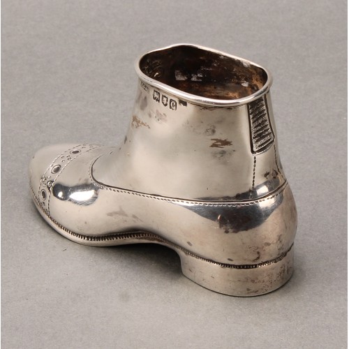 272 - A Victorian silver novelty table vesta and match striker, as a boot, 10cm long, James Greaves & Son,... 