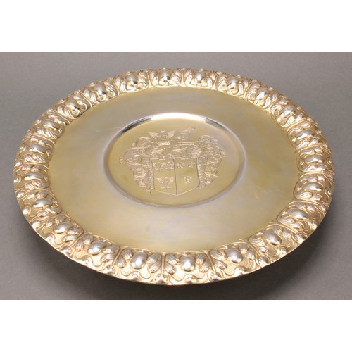 357 - A Commonwealth silver-gilt tazza, chased acanthus border, armorial field, trumpet shaped foot, 27cm ... 