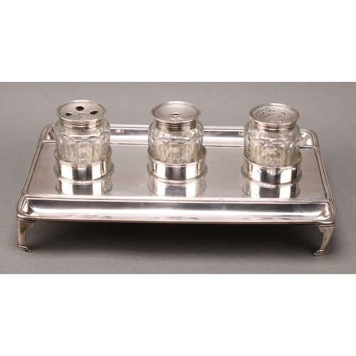 364 - A large George III silver rounded rectangular partners' inkstand, quite plain, glass wells and sande... 