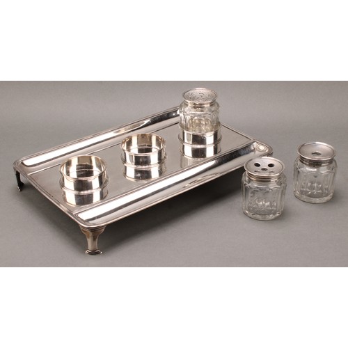 364 - A large George III silver rounded rectangular partners' inkstand, quite plain, glass wells and sande... 