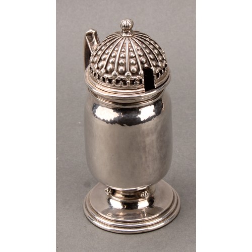 295 - Omar Ramsden - an Arts and Crafts silver mustard, hinged domed cover, angiular scroll handle, lightl... 