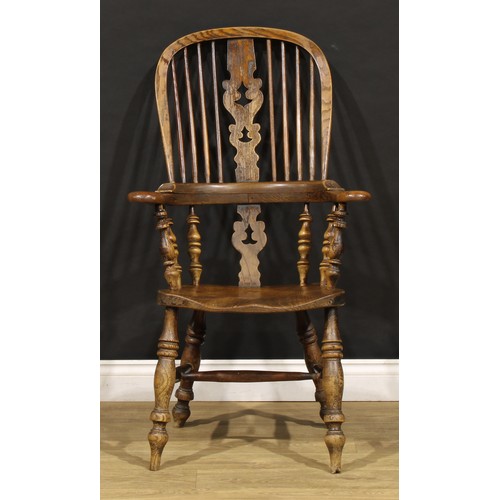 1678 - A 19th century Yorkshire beech, ash and elm Windsor elbow chair, 109.5cm high, 63cm wide, c.1850