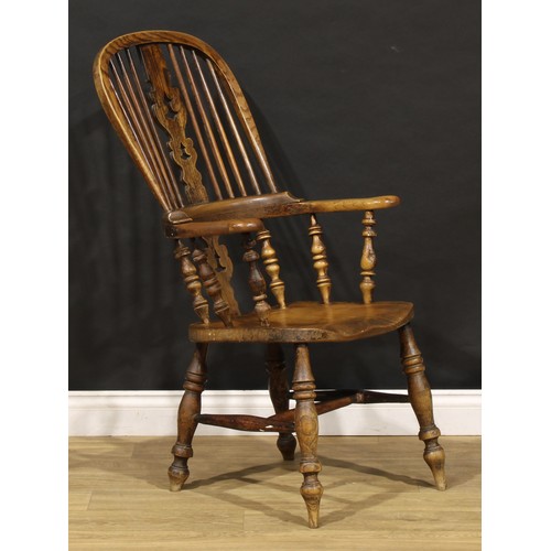 1678 - A 19th century Yorkshire beech, ash and elm Windsor elbow chair, 109.5cm high, 63cm wide, c.1850