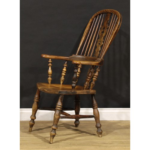 1678 - A 19th century Yorkshire beech, ash and elm Windsor elbow chair, 109.5cm high, 63cm wide, c.1850