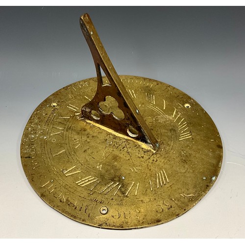 2106 - A Gothic Revival brass sundial, inscribed Seize the Present Moment, and The Evening Hour, 25cm diam,... 