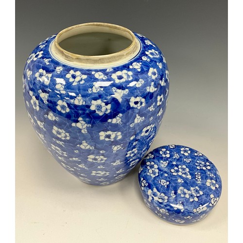 1420 - A late Qing Chinese blue and white ginger jar and cover, Hawthorn and Cracked Ice pattern, 26cm high