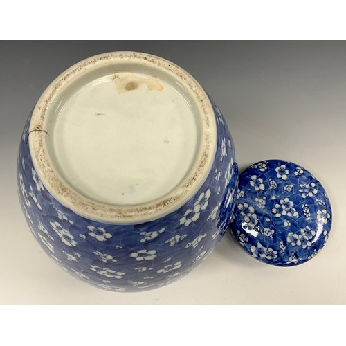 1420 - A late Qing Chinese blue and white ginger jar and cover, Hawthorn and Cracked Ice pattern, 26cm high