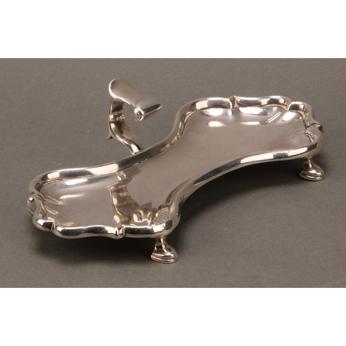 266 - A George II silver candle snuffer tray, of substantial gauge, flying-scroll handle, hoof feet, 18.5c... 