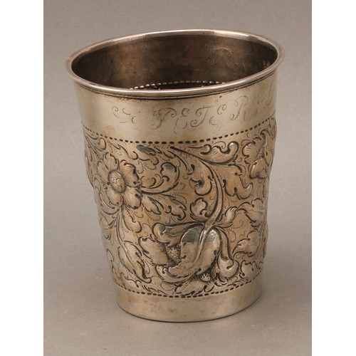 394 - A pair of large Danish silver tapered cylindrical beakers, chased with flowers and scrolling leaves,... 