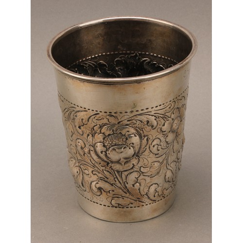 394 - A pair of large Danish silver tapered cylindrical beakers, chased with flowers and scrolling leaves,... 