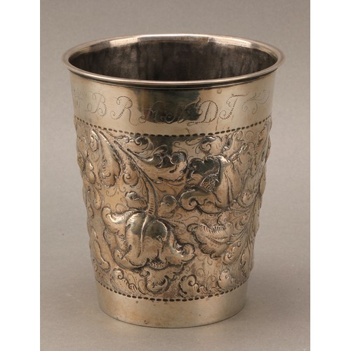 394 - A pair of large Danish silver tapered cylindrical beakers, chased with flowers and scrolling leaves,... 