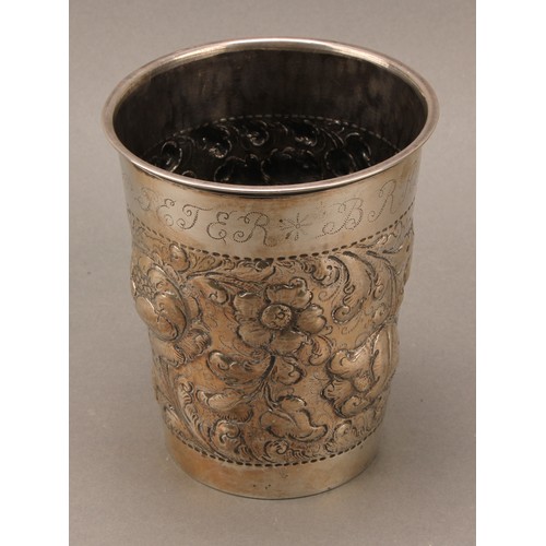 394 - A pair of large Danish silver tapered cylindrical beakers, chased with flowers and scrolling leaves,... 