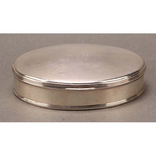 75 - A George III silver oval table snuff or tobacco box, hinged cover, 10.5cm wide, London 1801