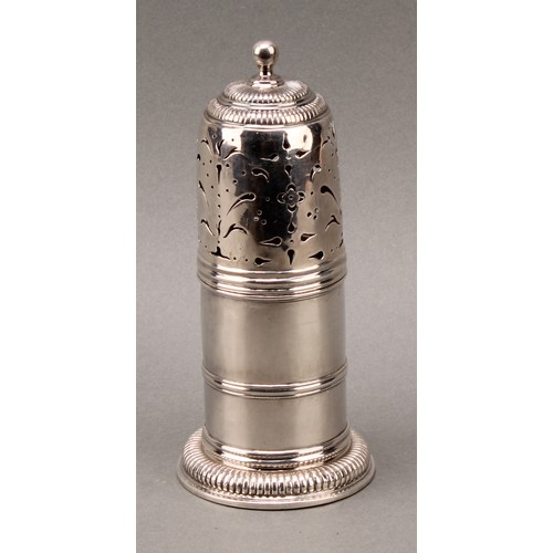 161 - A Queen Anne Britannia silver lighthouse sugar caster, push-fitting cover with ball finial, reeded t... 