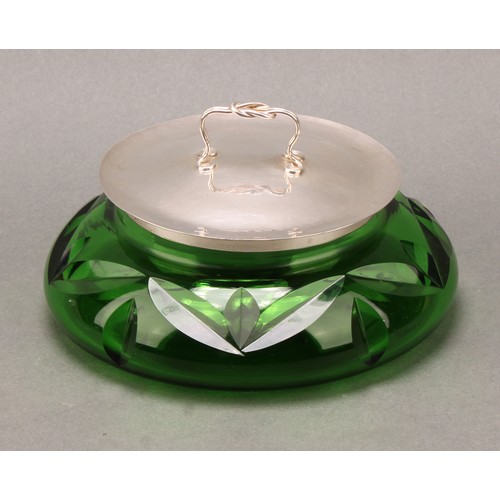 299 - Ramsden & Carr - an Arts and Crafts silver mounted green glass dressing table bowl, planished push-f... 