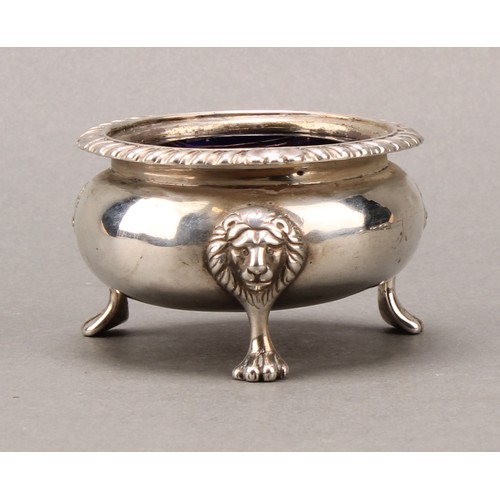 398 - A set of four Scottish Regency silver cauldron salts, gadrooned borders, lion monopodia, 7cm diam, G... 