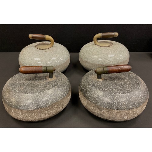 1852 - A pair of early 20th century Scottish granite curling stones, 27.5 cm diameter;  and another smaller... 