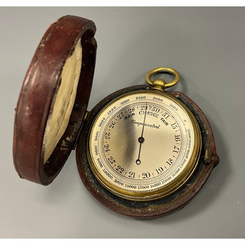 1583 - An early 20th century leather cased compensated pocket barometer, silvered register, engraved W G Lo... 