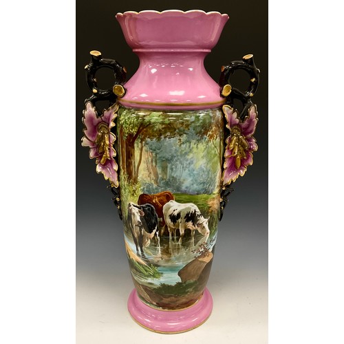 1207 - A large continental/French floor vase, fruiting vine and leaf handles, painted with cattle at water ... 