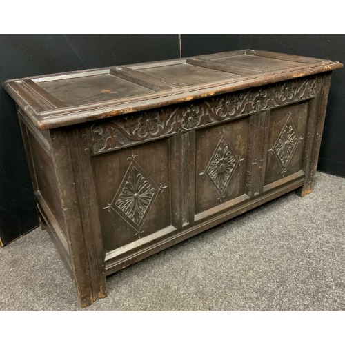 1726 - A Charles II oak three panel blanket chest, carved panels, stile feet, 61cm high x 118.5cm wide x 52... 