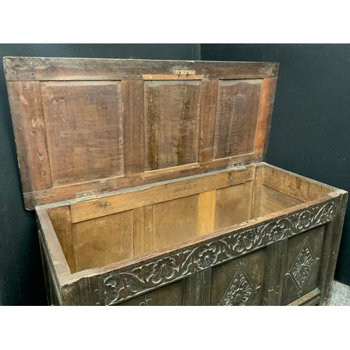 1726 - A Charles II oak three panel blanket chest, carved panels, stile feet, 61cm high x 118.5cm wide x 52... 