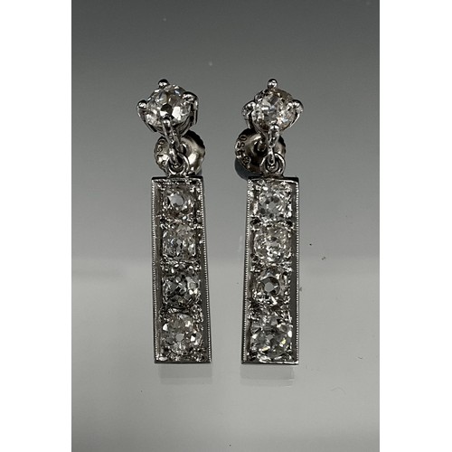 613 - A pair diamond drop earrings, each with a bar droplet set with four round brilliant cut diamonds, su... 