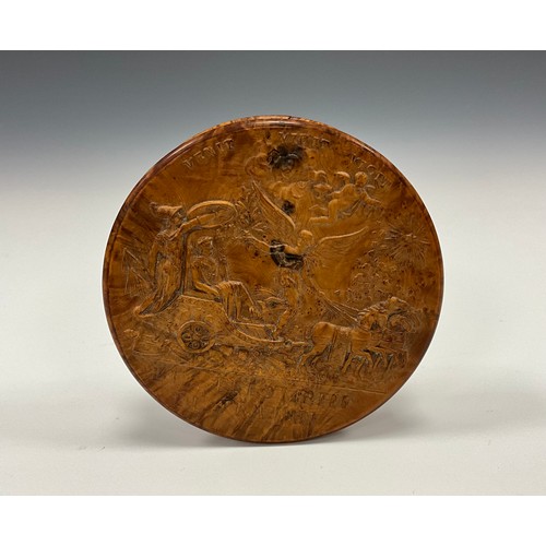 724 - Snuff Boxes  - a 19th century pressed wood circular snuff box, Filial Pity, An elderly Prisoner cond... 