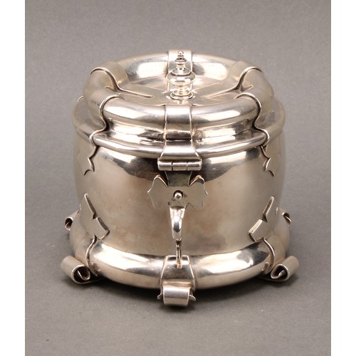 188 - Liberty & Co - an Arts and Crafts silver tea caddy, applied with scrolling brackets and cut-card wor... 