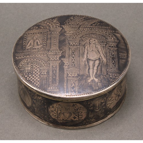 164 - A Russian silver and niello circular table snuff box or marriage casket, decorated with a courting c... 