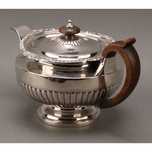 296 - Paul Storr - a George III silver half-fluted lamp shaped teapot, flush-hinged cover with knop finial... 