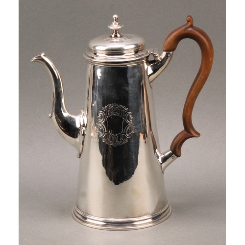 462 - An early George II silver spreading cylindrical coffee pot, quite plain, vacant Rococo cartouche, fr... 