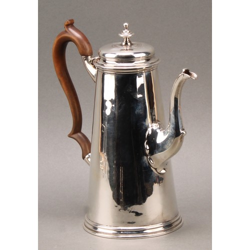 462 - An early George II silver spreading cylindrical coffee pot, quite plain, vacant Rococo cartouche, fr... 